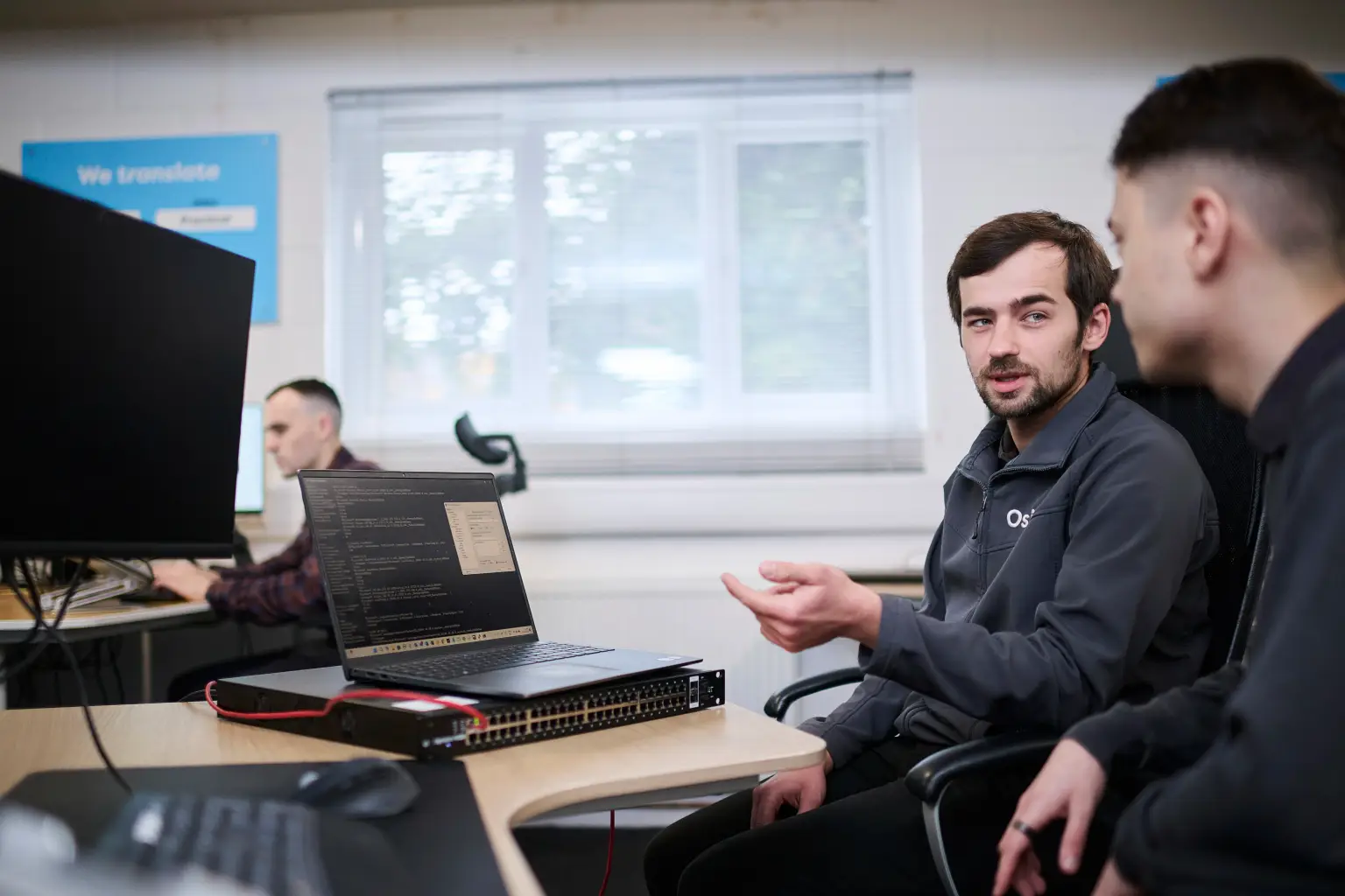 Osiris IT current team and office environment with over twenty qualified IT engineers